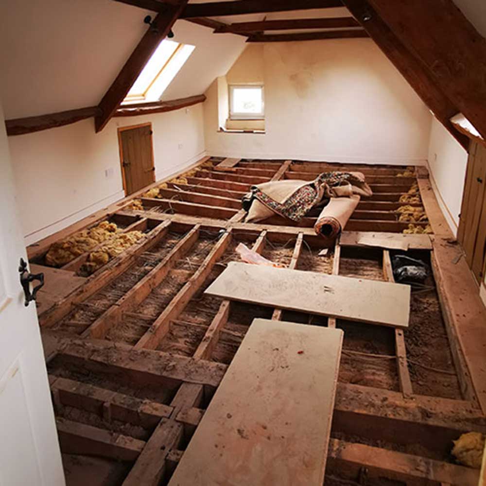 Woodworm treatment in progress, carpets and floorboards have been taken up.